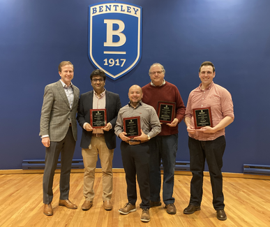 Bentley's Provost Paul Tesluk, far left, poses with the winners of the 2023 Innovation in Teaching Awards (from left): Gaurav Shah, Mateo Cruz, Mark Frydenberg and Jeff LeBlanc.
