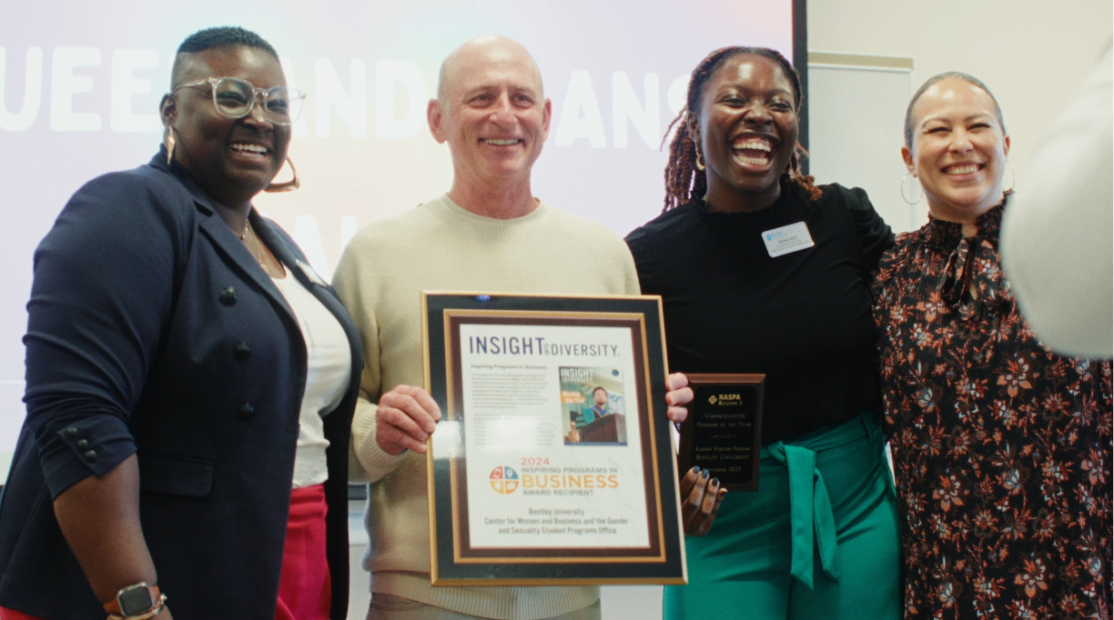 Bentley staff Dominique Wilburn, alumnus Paul Grover '81, staff Nana Adu and faculty Dr. Yaro Fong-Olivares with the Insight Into Diversity award plaque