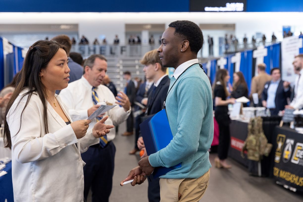 Bentley University career fair participants networking