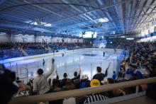 packed arena during hockey game