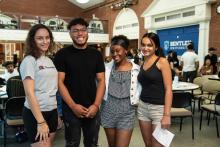 group of students laugh together