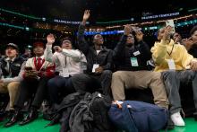 Participants at Celtics Career Day, presented by Bentley University, sitting courtside at TD Garden