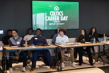 Students listen to speakers at Celtics Career Day