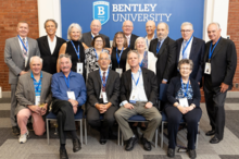 Bentley alumni in the Class of 1974 pose for a class photo