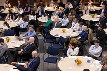 Bird’s-eye view of audience during AI Summit panel discussion. 