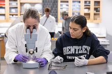 Professor and student in lab