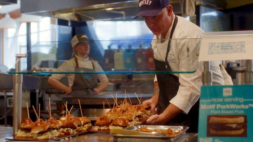 Bentley University Dining staff serving plant-based sandwiches