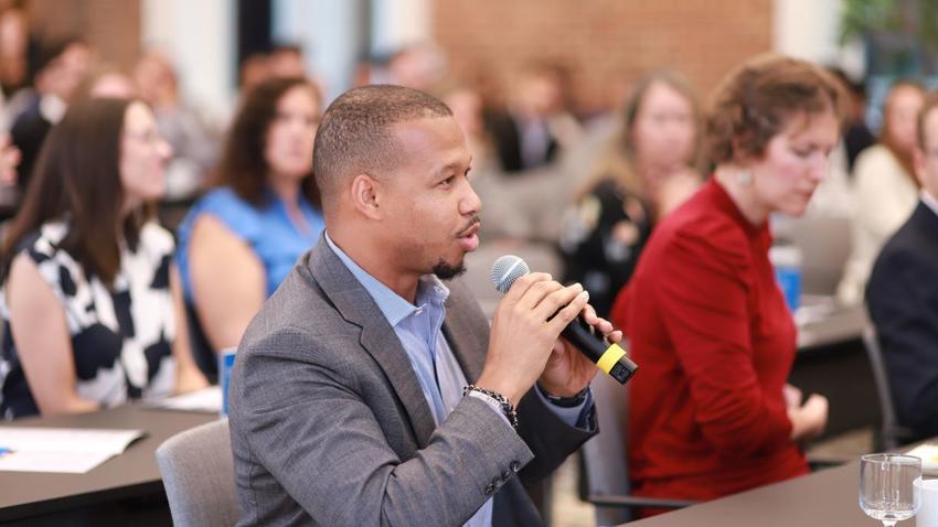 Attendee asks a question at Bentley-Gallup Business in Society event in Washington, D.C.