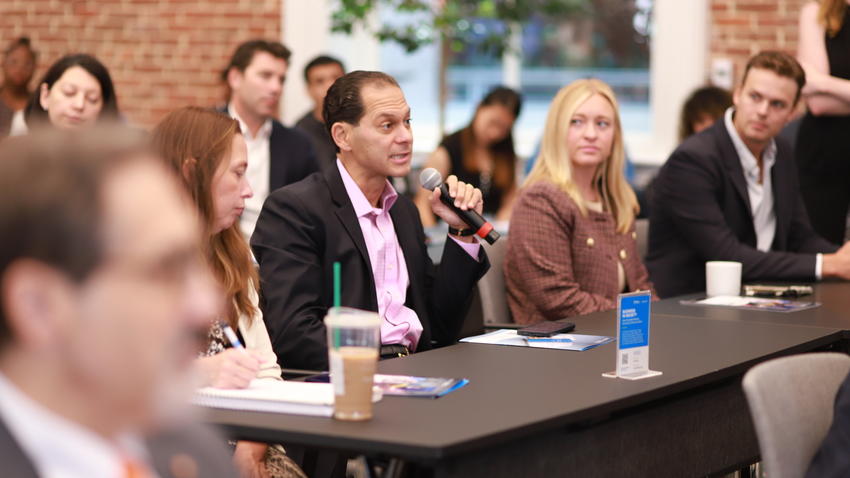 Attendee asks a question at Bentley-Gallup Business in Society event in Washington, D.C.