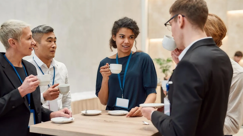 A group of professionals having breakfast together