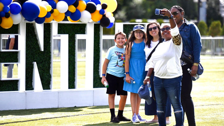 Selfie at Falcon Weekend banner