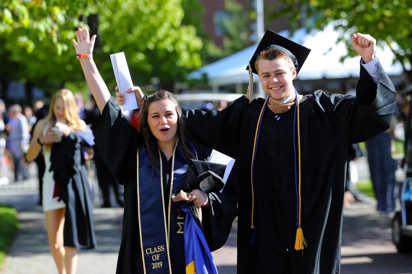 Bentley University students celebrate at graduation Thumbnail