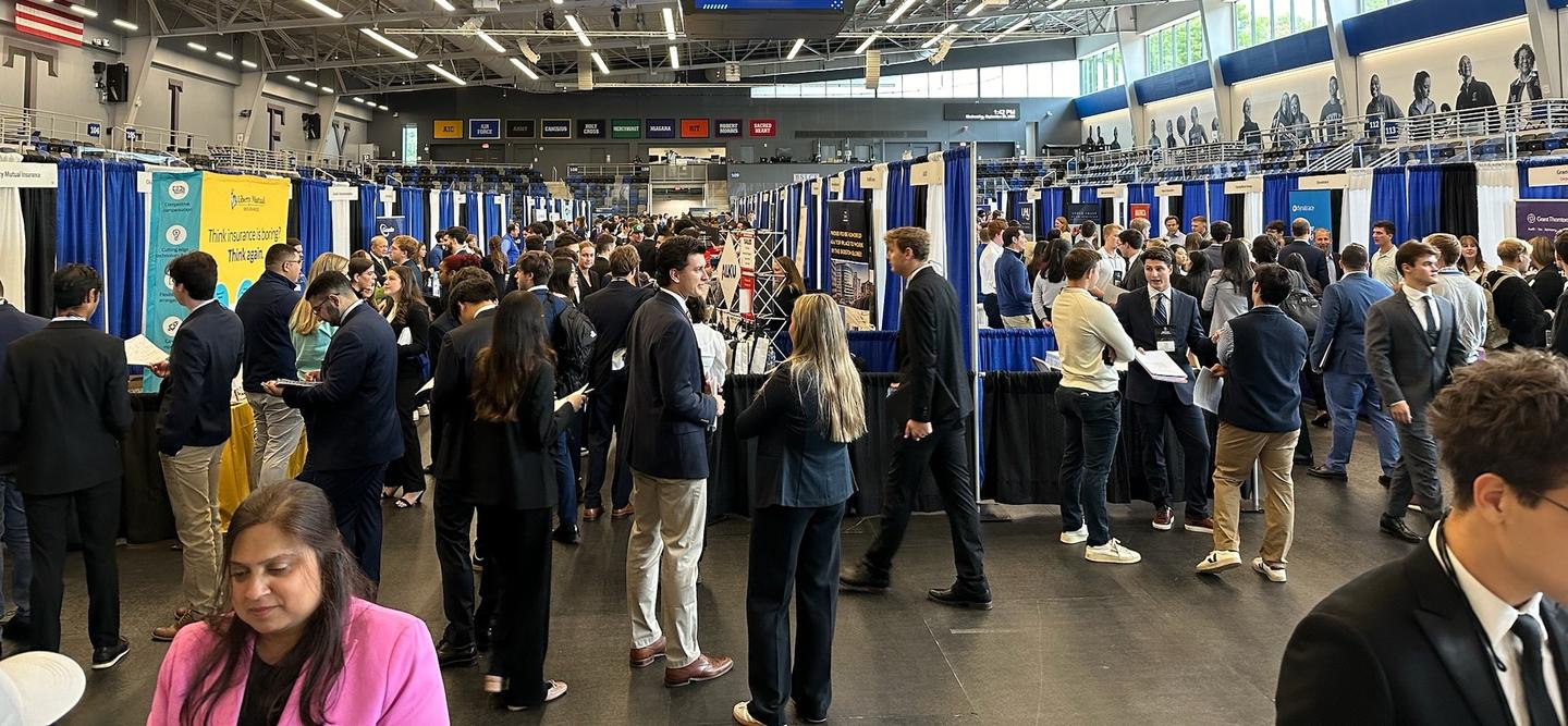 Students and Employers in the Bentley Arena attending the Career Fair