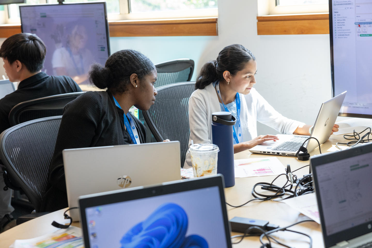 two students in precollege classroom