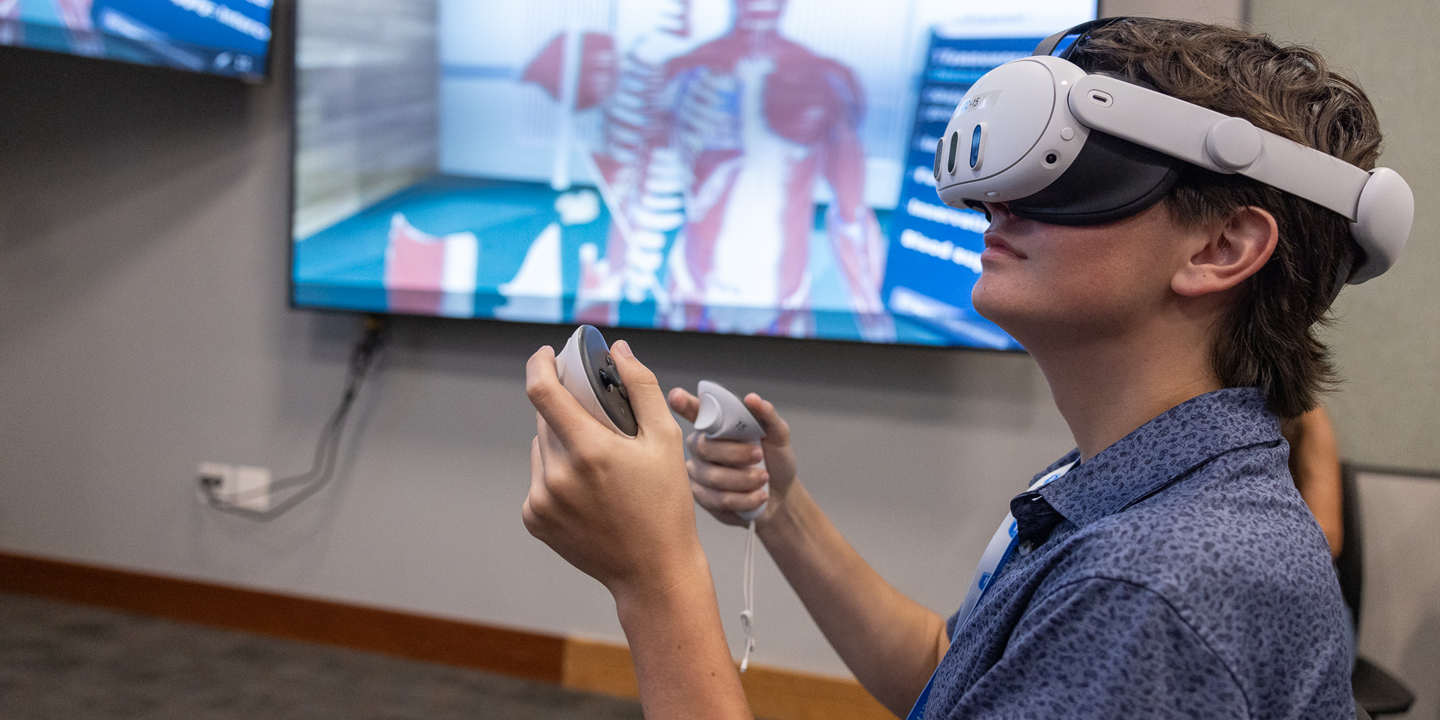 Student using VR goggles