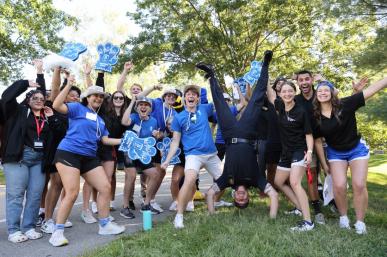 A group of current Bentley students welcome new Falcons to campus during Move-In Day 2023.
