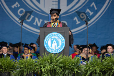 Sanay Jhaveri delivers the undergraduate student address from the podium