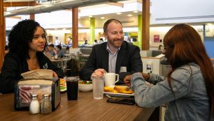 Director of Dining Services Rich Rubini speaks with Bentley students
