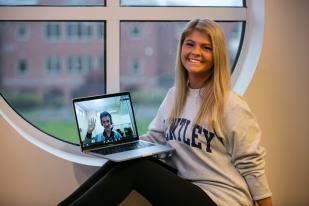 Bentley University student Mary Sullivan tutors Afghan students