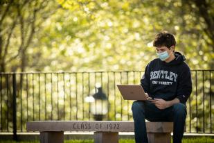 Student with a face covering